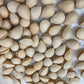 Almendritas de oblea rellenas de turrón a la piedra, terminadas a mano una a una