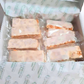 Porciones de Turrón Blando (Jijona)  y Duro (Alicante) en cajas a granel - Caja de 1,5kg  (60 unidades aprox)