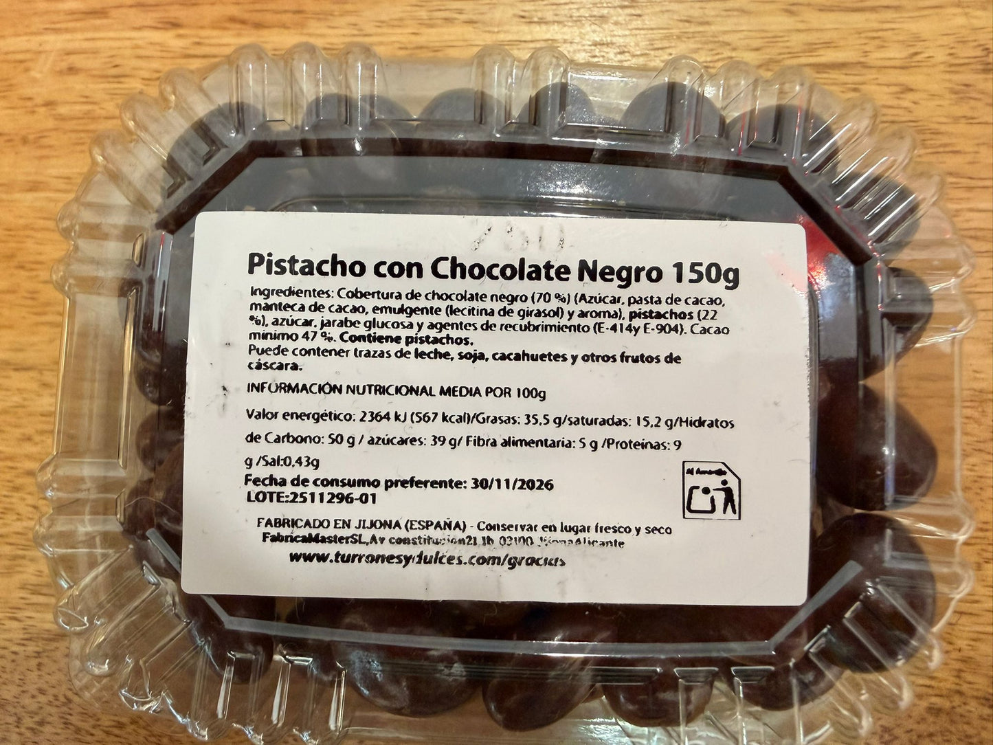 bandeja de pistacho cubierto de chocolate por 150 g
